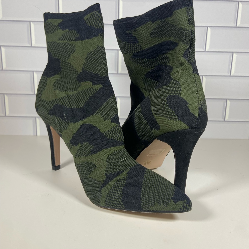 Green and black camo knit ankle boots with a pointed toe and 4” heel